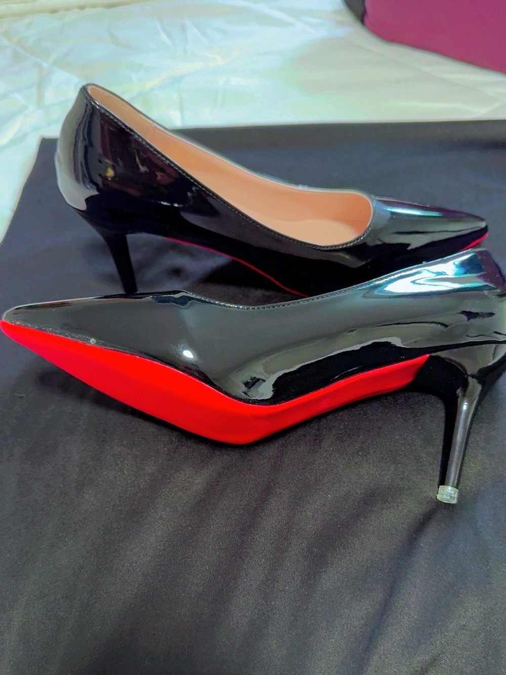 Classic Black Patent Pointed-Toe Pumps with Red Sole